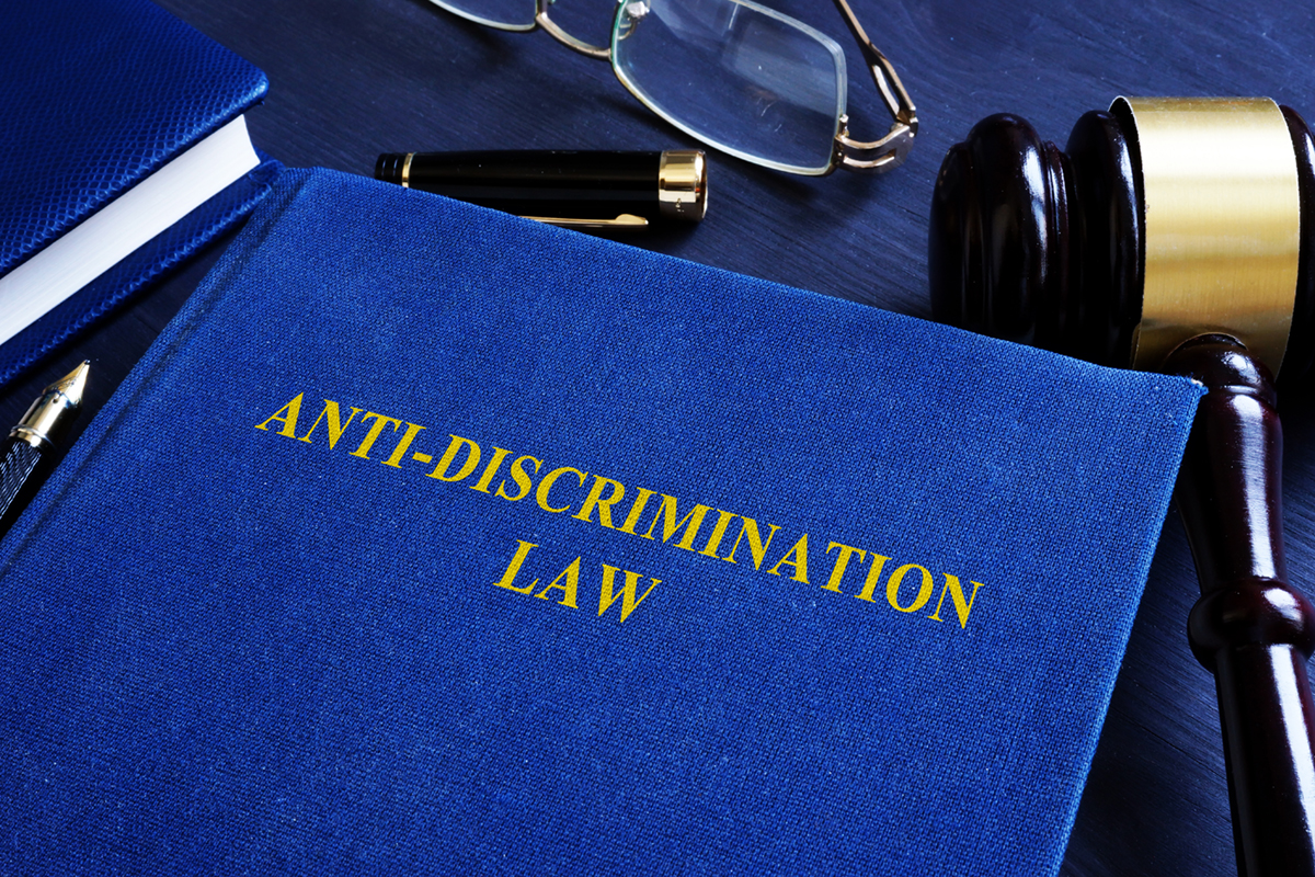 Anti-discrimination law and gavel in the court.